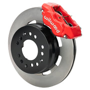 Wilwood red Dynalite front caliper beside the assembled 12.19-inch plain rotor and hat for aluminum ProSpindle