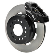 Wilwood black Dynalite front caliper beside the assembled 12.19-inch plain rotor and hat for aluminum ProSpindle
