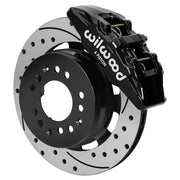 Wilwood black DP6A front caliper beside the assembled 12.19-inch drilled and slotted rotor and hat for aluminum ProSpindle
