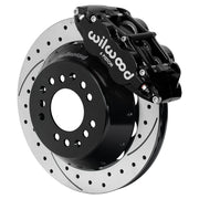 Wilwood black FNSL6R front caliper beside the assembled 12.88-inch drilled and slotted rotor and hat for aluminum ProSpindle