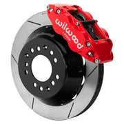 Wilwood red FNSL6R front caliper beside the assembled 12.88-inch slotted rotor and hat for aluminum ProSpindle