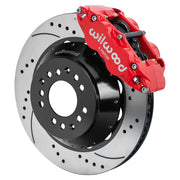 Wilwood red FNSL6R front caliper beside the assembled 14.00-inch drilled and slotted rotor and hat for aluminum ProSpindle