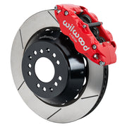 Wilwood red FNSL6R front caliper beside the assembled 14.00-inch slotted rotor and hat for aluminum ProSpindle