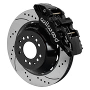 Wilwood black AERO6 front caliper beside the assembled 14.00-inch drilled and slotted rotor and hat for aluminum ProSpindle