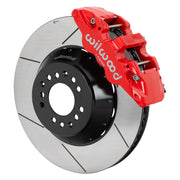 Wilwood red AERO6 front caliper beside the assembled 15.00-inch slotted rotor and hat for aluminum ProSpindle
