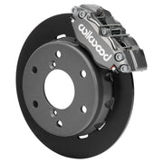 Wilwood anodized NDPR front caliper beside the assembled 11.60-inch plain rotor and hat for Can-Am Maverick R