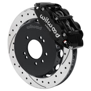 Wilwood black FNSL6R front caliper with 12.88-inch drilled and slotted rotor, assembled brake view for 1999–2002 Nissan Skyline R34