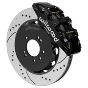 Wilwood black AERO6 front caliper with 14.00-inch drilled and slotted rotor, assembled brake view for 1999–2002 Nissan Skyline R34