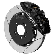 Wilwood black AERO6 front caliper with 14.00-inch slotted rotor, assembled brake view for 1999–2002 Nissan Skyline R34
