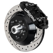 Wilwood black XRS6R front caliper with 12.88-inch drilled and slotted rotor, assembled brake view for Chevrolet / GMC Trucks with Wilwood Iron ProSpindles