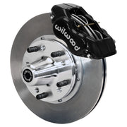 Wilwood black Forged Dynalite Internal front caliper with 11.00-inch plain rotor, assembled brake view for 1955–1957 Chevrolet with Aftermarket Drop Spindles