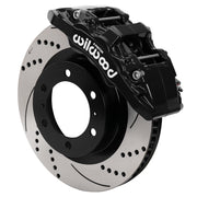 Assembled Wilwood front AERO6-DM caliper and rotor assembly for Toyota Tacoma, SRP drilled and slotted rotor and black powder coat caliper