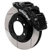 Assembled Wilwood front AERO6-DM caliper and rotor assembly for Toyota Tacoma, GT-slotted rotor and black powder coat caliper