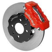Representative assembled Wilwood red Dynalite caliper and plain face rotor; hat drilling differs from the four-lug Honda kit