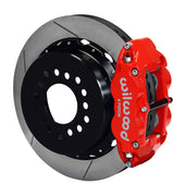 Wilwood red Superlite 4R caliper and 12.88-inch gt slotted rotor for Special Chevy 12-Bolt 3.15-Inch-Bearing Axles, 2.81-Inch Offset, assembled rear view