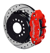 Assembled view of a Wilwood red FNSL4R rear caliper with a 12.88-inch drilled and slotted rotor