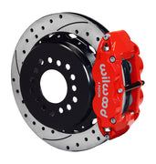 Assembled view of a Wilwood red FNSL4R rear caliper with a 12.88-inch drilled and slotted rotor
