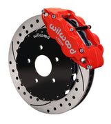 Assembled view of a Wilwood red FNSL6R front caliper with a 14.00-inch drilled and slotted rotor