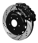 Assembled view of a Wilwood black FNSL6R front caliper with a 14.00-inch drilled and slotted rotor