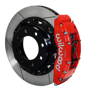 Assembled view of a Wilwood red TC6R rear caliper with a 16.00-inch slotted rotor