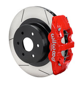 Assembled view of a Wilwood red AERO4 rear caliper with a 14.25-inch slotted rotor