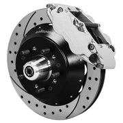 Assembled view of a Wilwood polished FNSL6R front caliper with a 12.88-inch drilled and slotted rotor