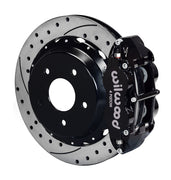 Assembled view of a Wilwood black FNSL4R rear caliper with a 12.88-inch drilled and slotted rotor