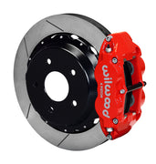 Assembled view of a Wilwood red FNSL4R rear caliper with a 12.88-inch slotted rotor