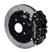 Assembled view of a Wilwood black FNSL4R rear caliper with a 12.88-inch slotted rotor