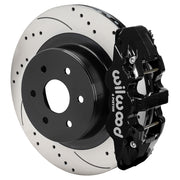 Wilwood AERO4 rear brake assembly with black caliper and drilled-and-slotted rotors