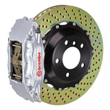 The Brembo Gran Turismo Front Big Brake Kit for 964 Carrera 2 (1990-94) features GT 4-Piston calipers, FM1000 pads, 332mm x 32mm cross-drilled rotors, Goodrich braided lines, and CNC billet mounts. It delivers top-notch braking performance and reliability.