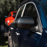 Rennline Carbon Fiber Mirrors for Cayenne: Sleek, durable carbon fiber upgrade with perfect OEM fit and easy installation. Shop now at PMB Performance.