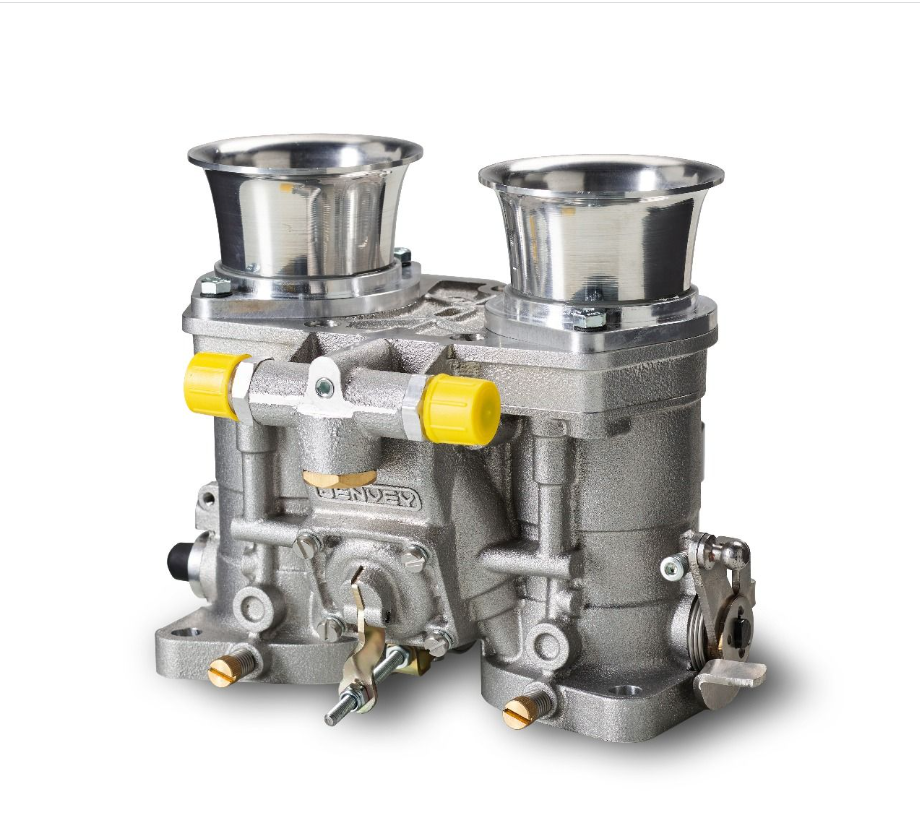 A Jenvey Heritage Series IDF throttle body photographed against a white background, its twin polished velocity stacks and cast aluminium body styled to resemble a Weber IDF carburetor.