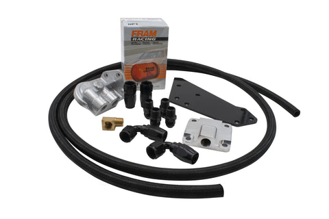 Enhance engine performance with the BUGPACK Full Flow Oil Filter Kit. This kit features a billet full flow pump cover, oil filter adapter, under fender mount, FRAHM HP-1 oil filter, 6 feet of XRP -8 hose, and XRP fittings. Available with XR-31 black woven hose or braided stainless steel hose with XRP fittings. Ensure your oil pump is plugged for full flow.