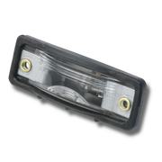 License Plate Light for Porsche 914 (1970-74) Guaranteed Fitment 24 Month Unlimited Mileage Warranty High Quality Materials Manufactured to factory license lamp dimensions for easy installation and attractive appearance Crystal-clear lens with accurate color reproduction OE-style reflector finish restores proper license plate illumination #35 in Diagram. 1 Required per car. Replaces: 914 631 601 00, 91463160100