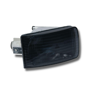 Porsche 911 (1989-94) Front Right Smoked USA Spec Turn Signal Lens: Upgrade your Porsche's look with this smoked USA spec front right turn signal lens. Designed for guaranteed fitment and easy installation, it restores proper illumination and enhances visibility. 24-month unlimited mileage warranty. Replaces: 91163195700. #35 in Diagram.