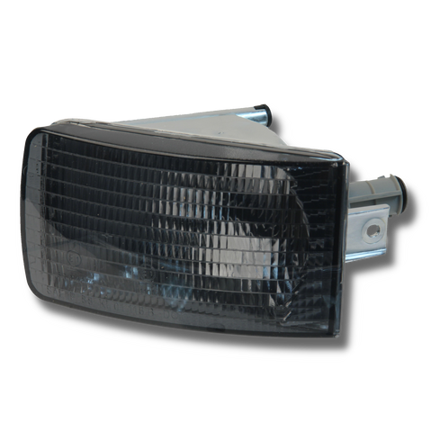 Front Left Smoked Euro Turn Signal Lens for Porsche 911 (1989-94): Upgrade your Porsche 911 with this smoked Euro spec turn signal lens. Crystal-clear lens and quality reflector finish ensure proper illumination and attractive appearance. Guaranteed fitment and 24-month unlimited mileage warranty. Replaces: 96463140500SM. #35 in Diagram.