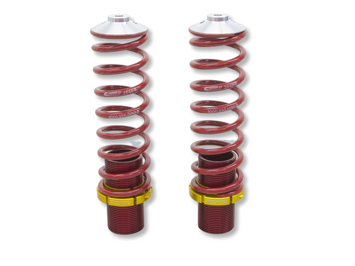 A pair of Ground Control adjustable rear springs for the Porsche 914: red Eibach coil springs on threaded sleeves with gold adjustment collars and polished upper caps.